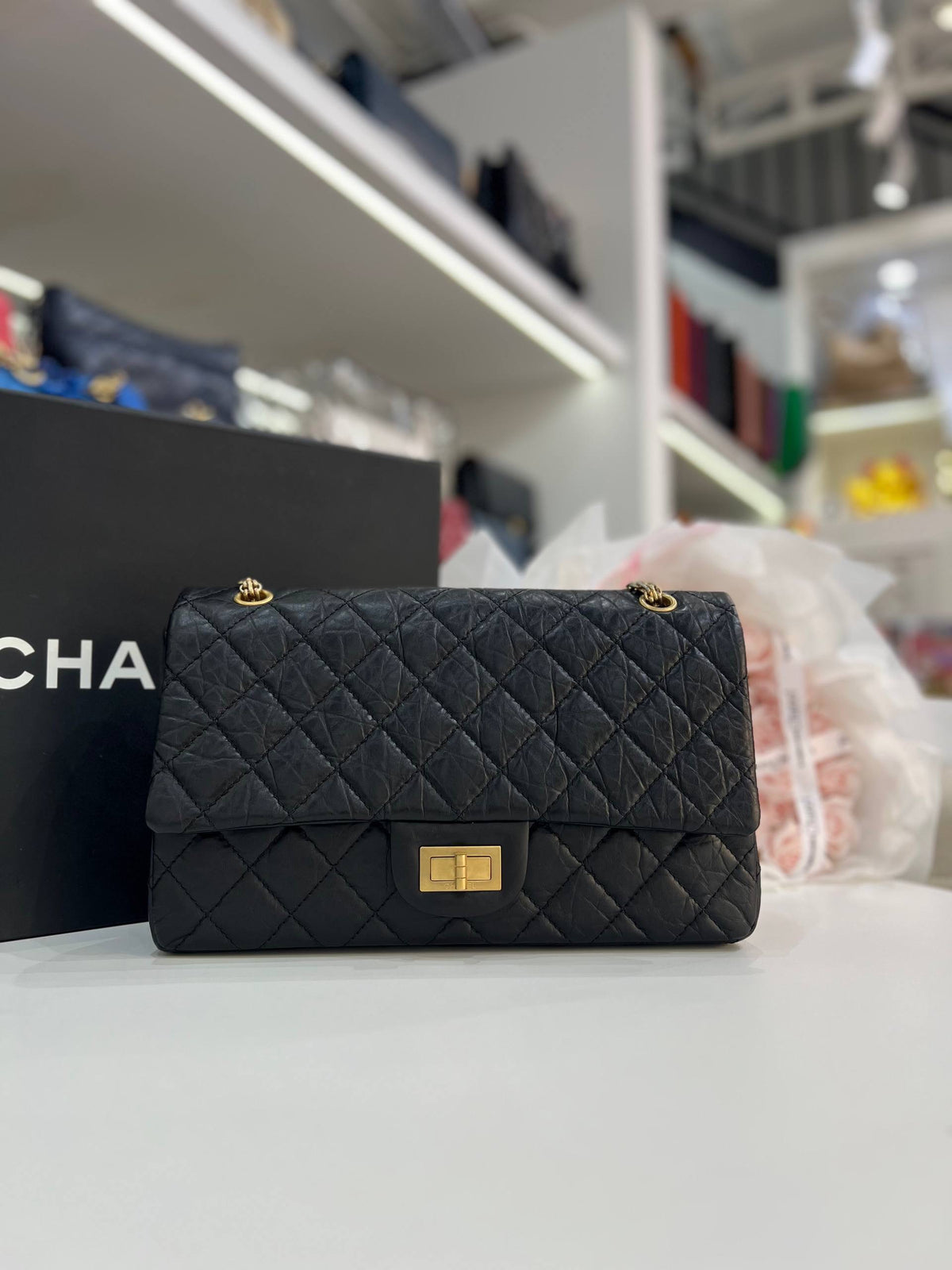 CHANEL 2.55 Reissue Double Flap Bag In Black Aged Calfskin