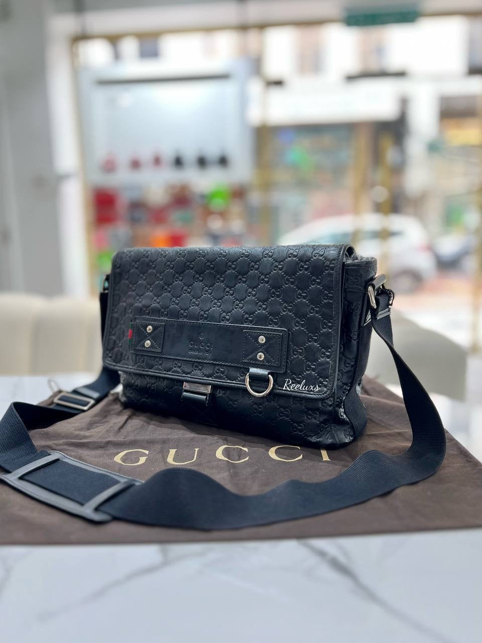 GUCCI Black Guccissima Crossbody Bag