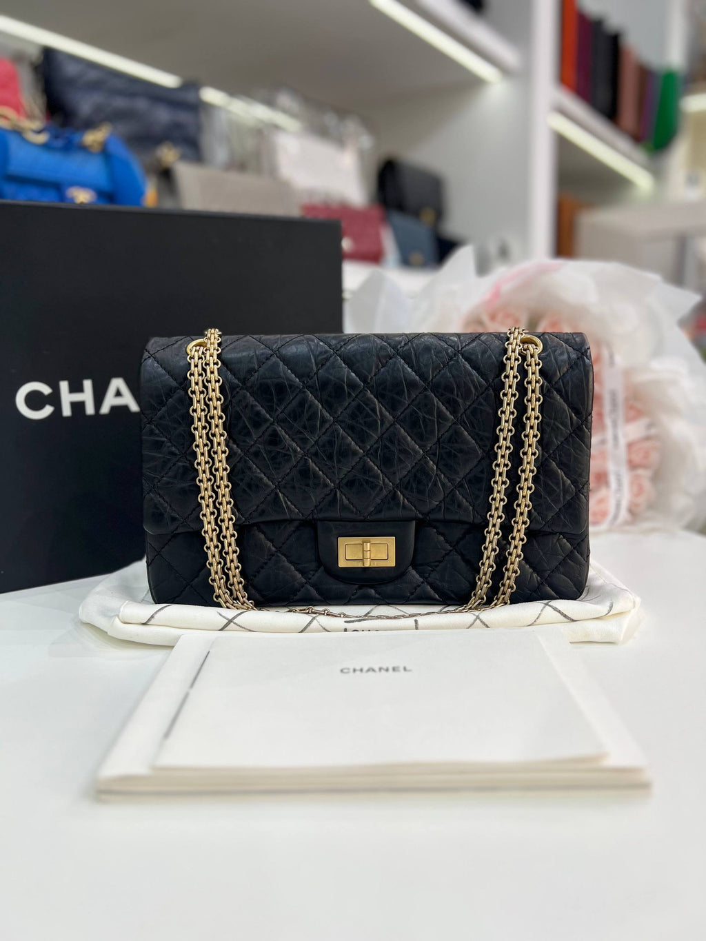 CHANEL 2.55 Reissue Double Flap Bag In Black Aged Calfskin