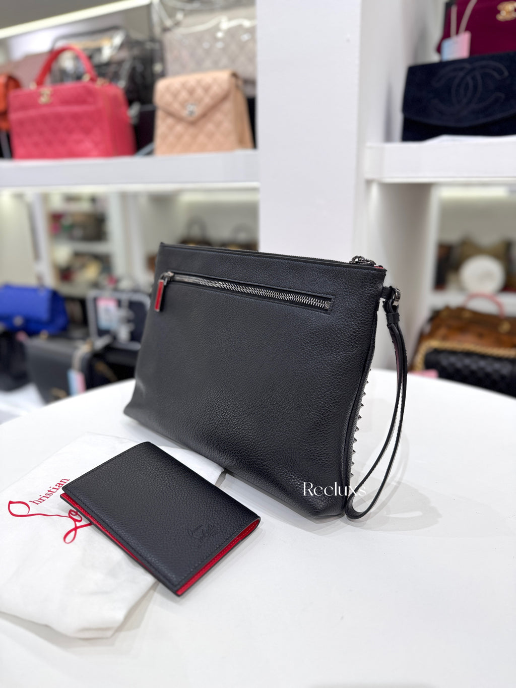 CHRISTIAN LOUBOUTINE Funky Spiked Leather Pouch In Black