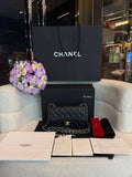 Chanel Classic Mini Flap Bag in black lambskin leather