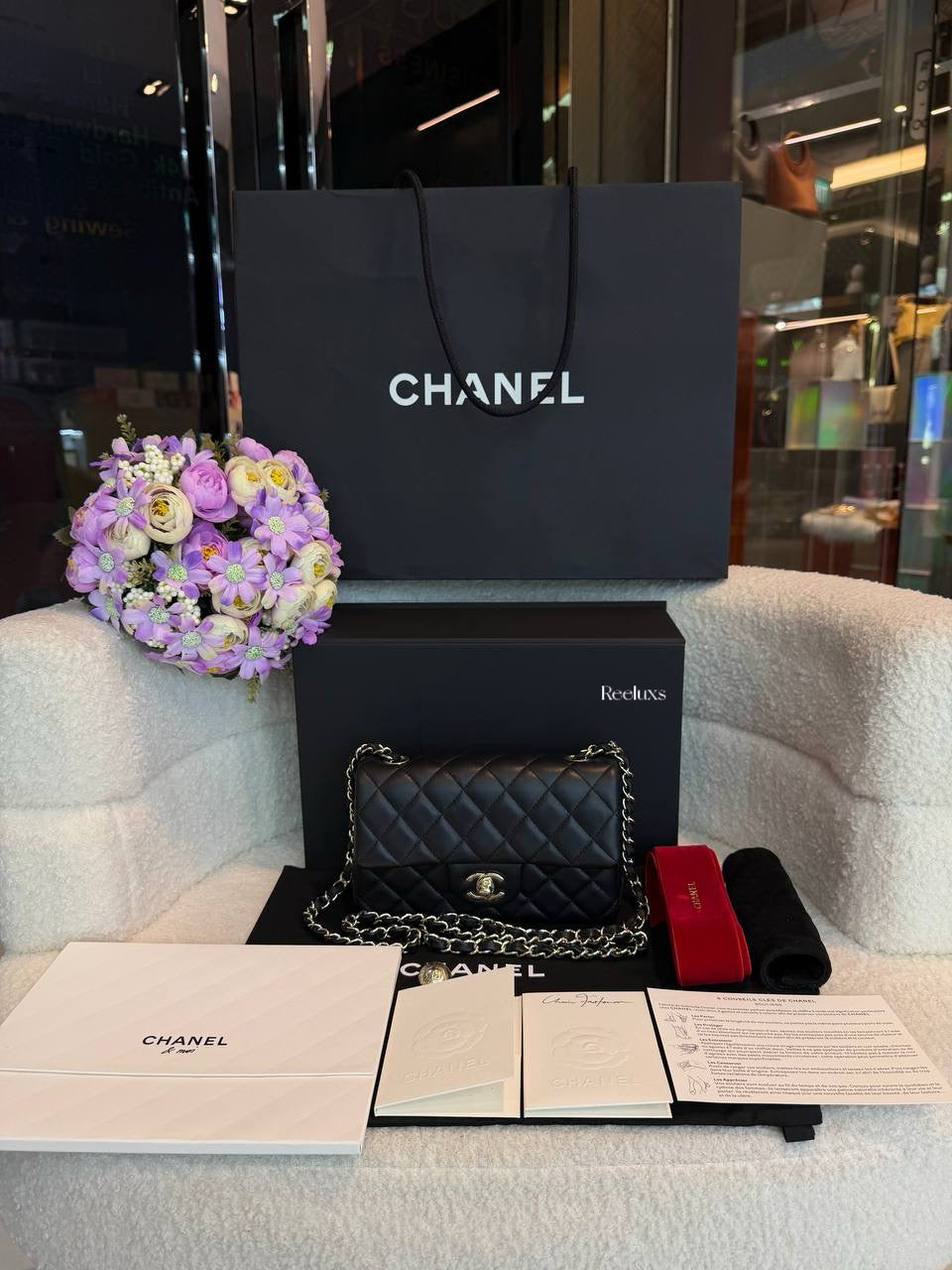 Chanel Classic Mini Flap Bag in black lambskin leather