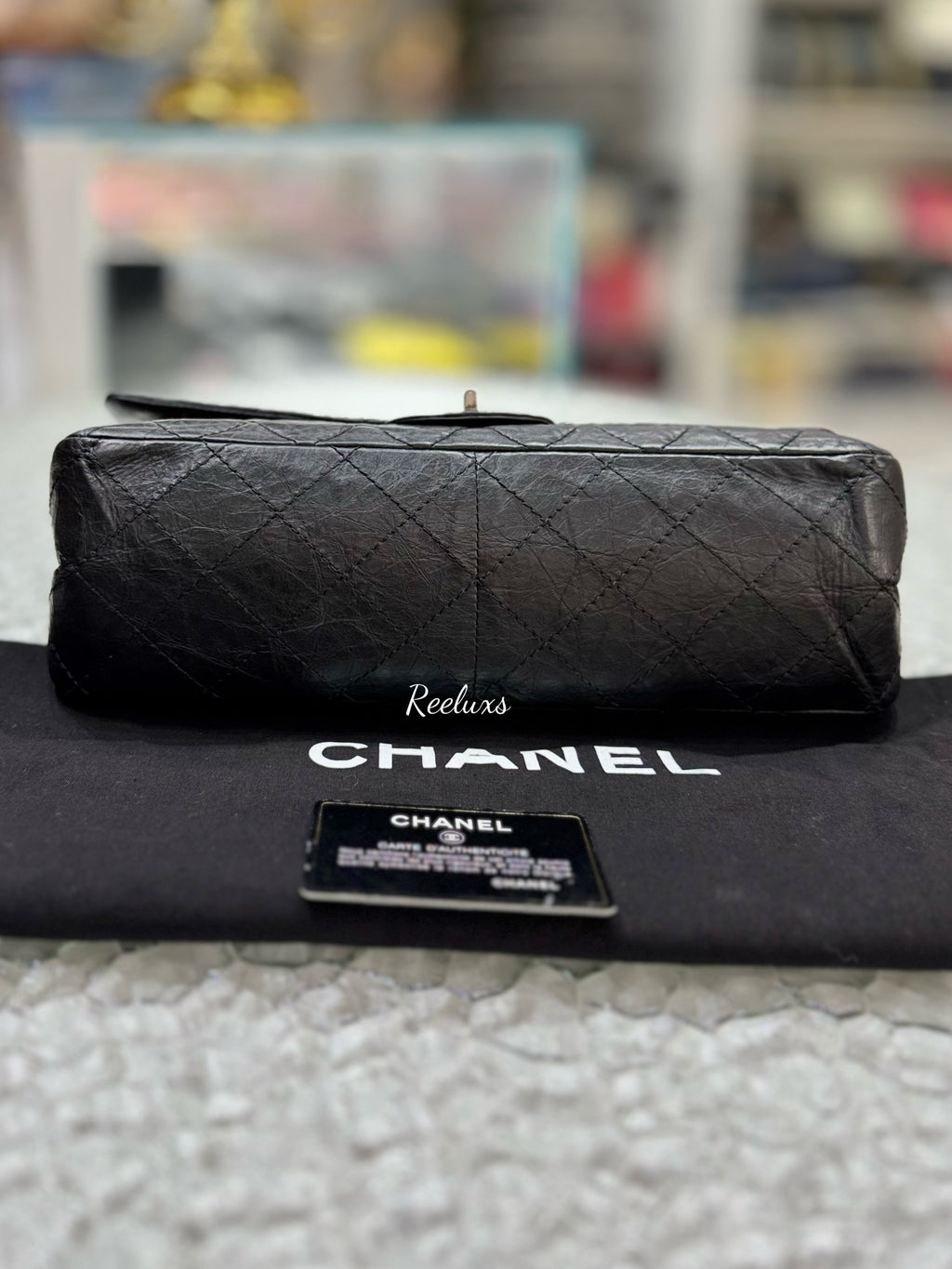 CHANEL Quilted Aged Leather Reissue 2.55 Classic Flap Bag