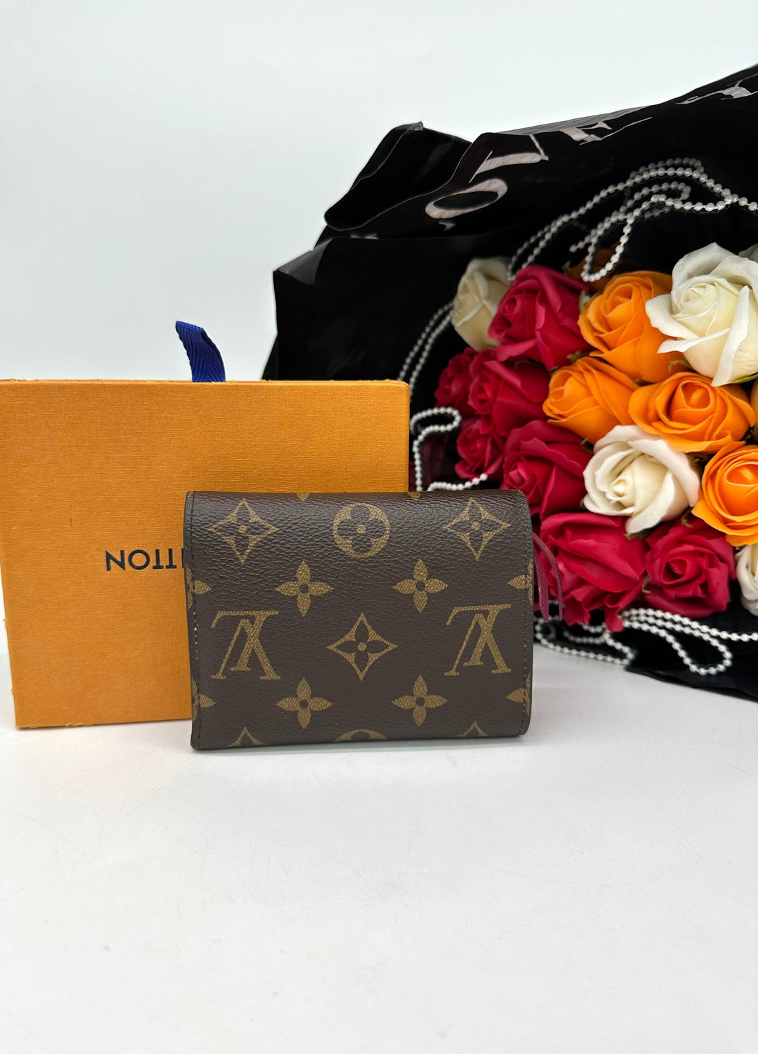 LOUIS VUITTON Monogram Canvas Victorine Wallet - Reeluxs 