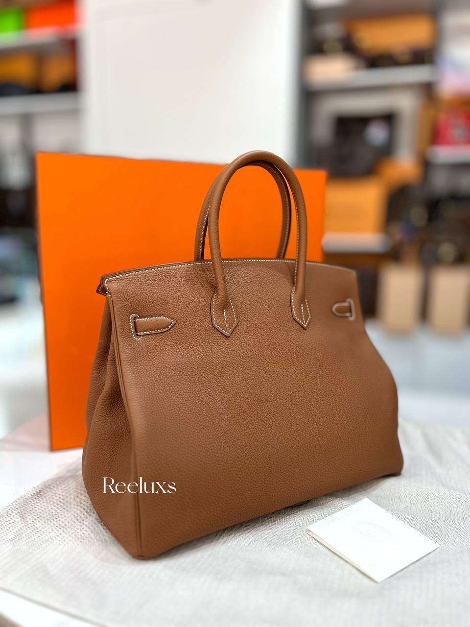 HERMES Birkin 35 Handbag in Gold Togo Leather with Palladium Hardware