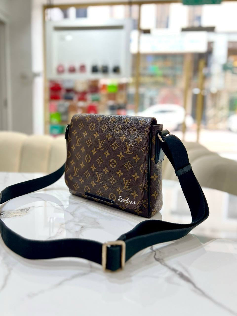 LOUIS VUITTON LV Monogram District PM Brown Messenger Bags