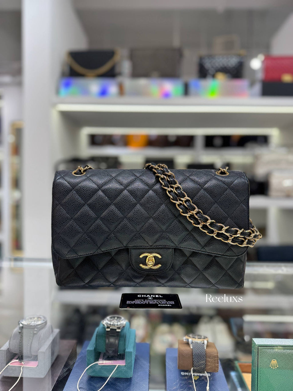 CHANEL Classic Jumbo Flag Bag In Black Quilted Caviar Leather