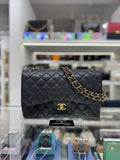 CHANEL Classic Jumbo Flag Bag In Black Quilted Caviar Leather