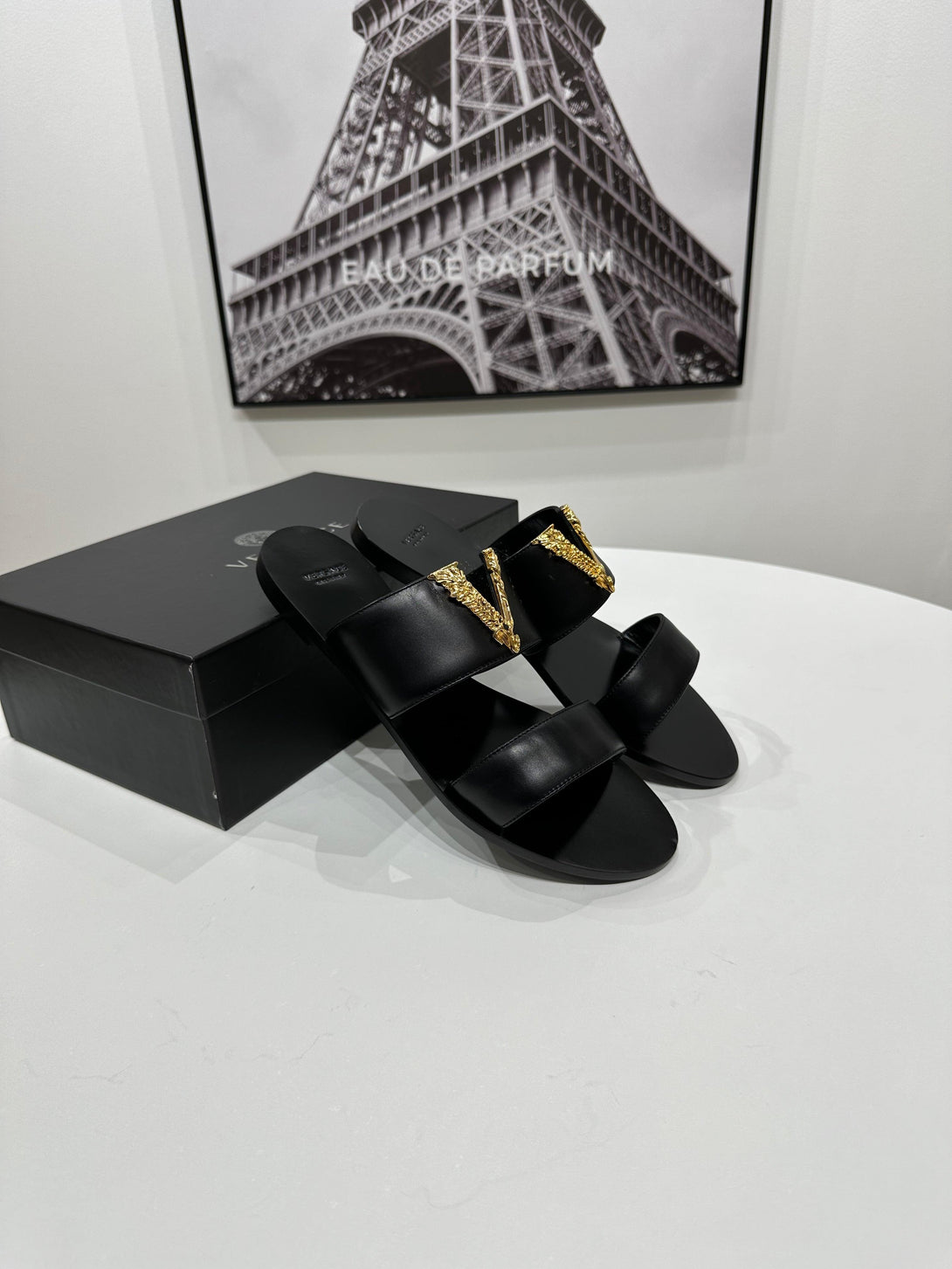 VERSACE
Black Virtus Flat Sandals - Reeluxs 