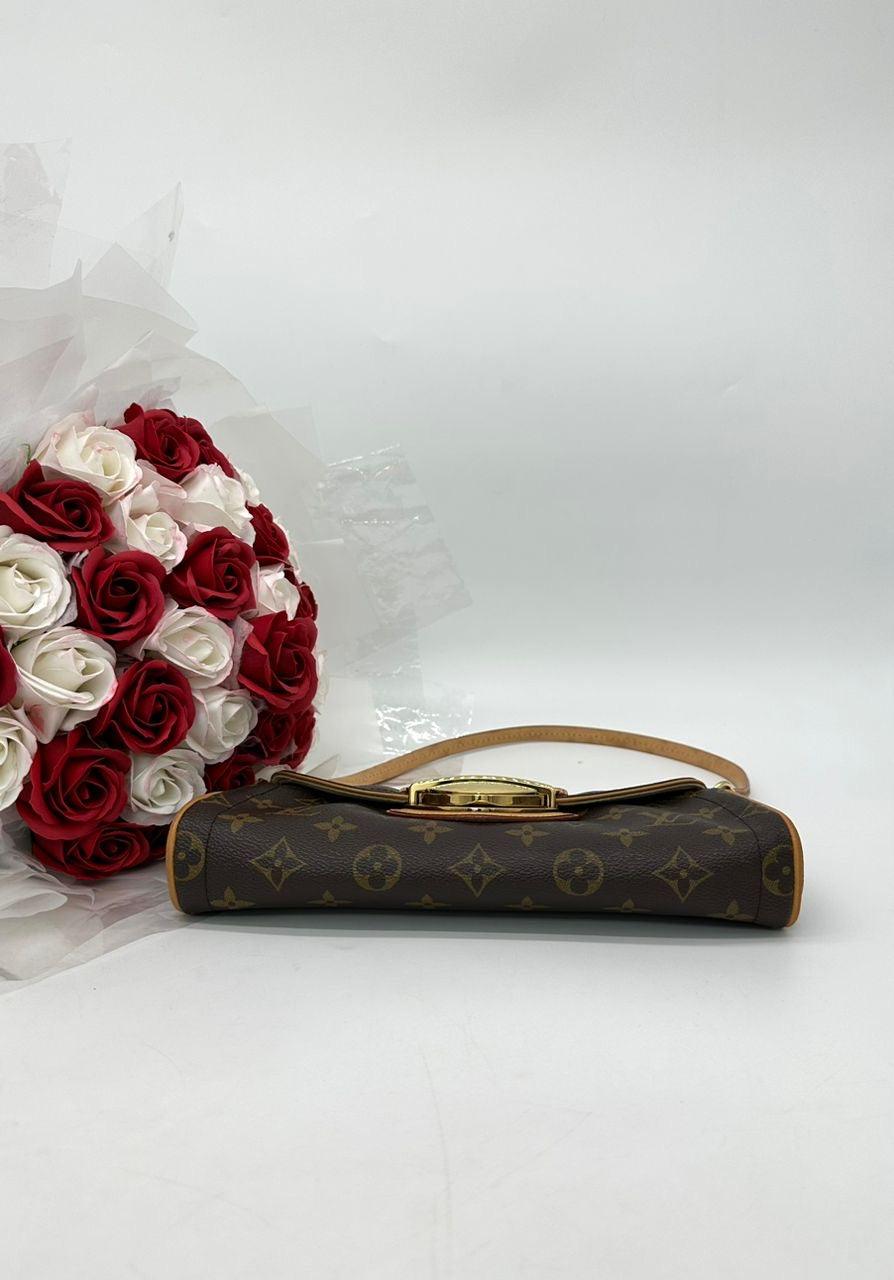 Louis Vuitton
Brown Monogram Beverly Pochette Bag - Reeluxs 