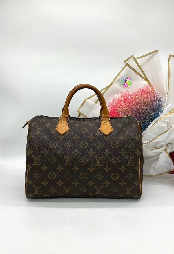 LOUIS VUITTON Speedy 30 Ladies Handbag - Reeluxs 