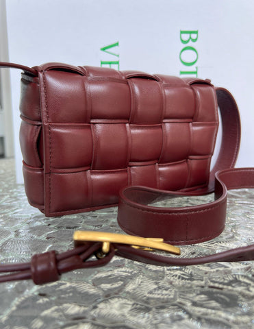 BOTTEGA VENETA Small Burgundy Padded Cassette Crossbody Bag For Lady - Reeluxs 