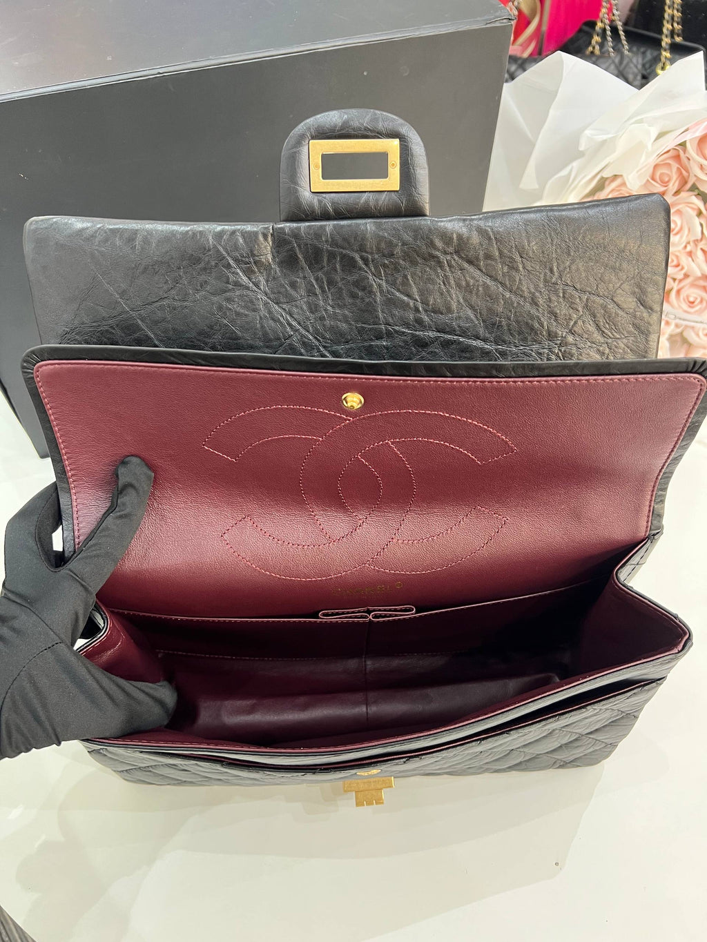CHANEL 2.55 Reissue Double Flap Bag In Black Aged Calfskin