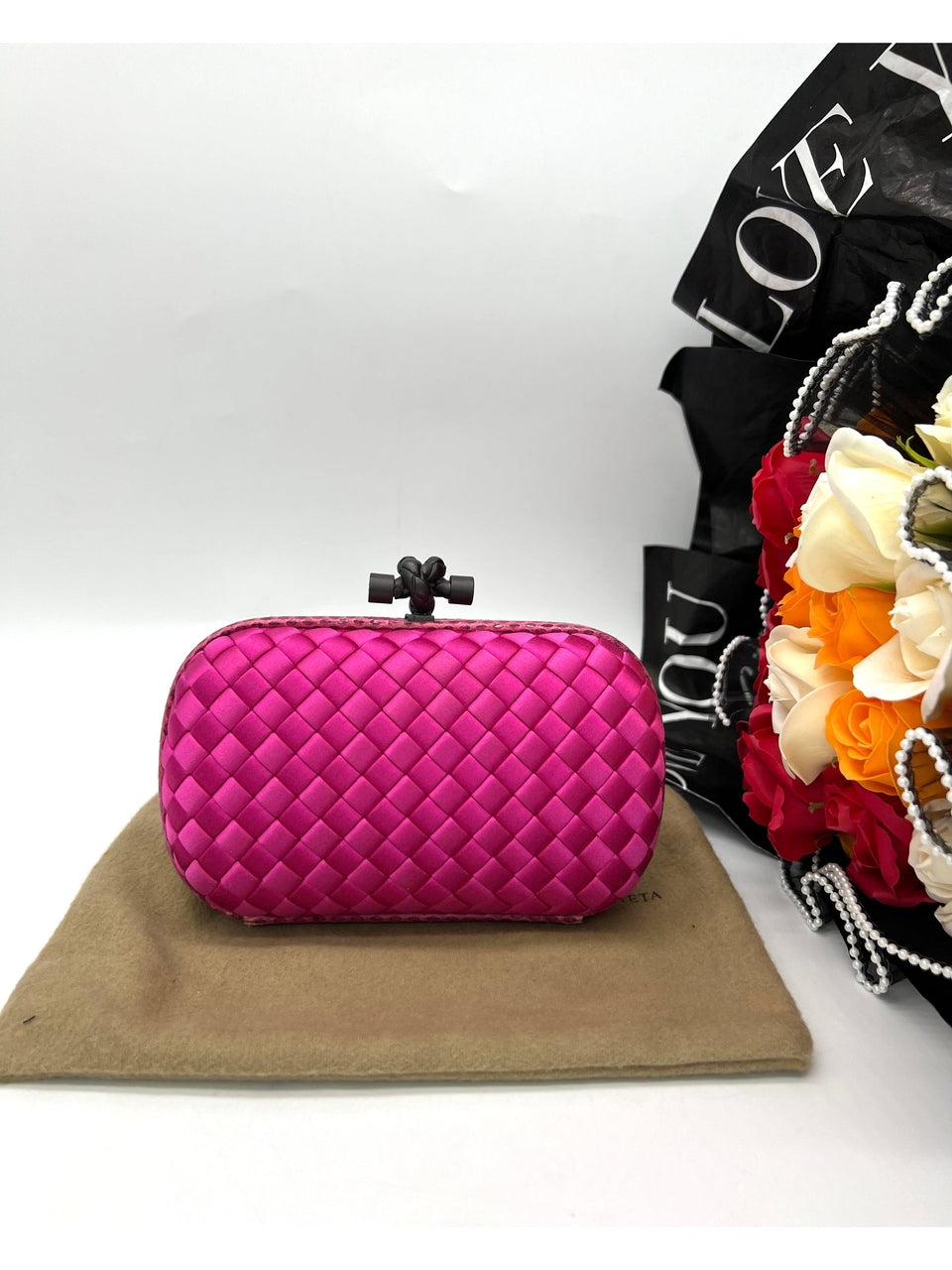 BOTTEGA VENETA Intrecciato Knot Clutch in Fuchsia Silk - Reeluxs 