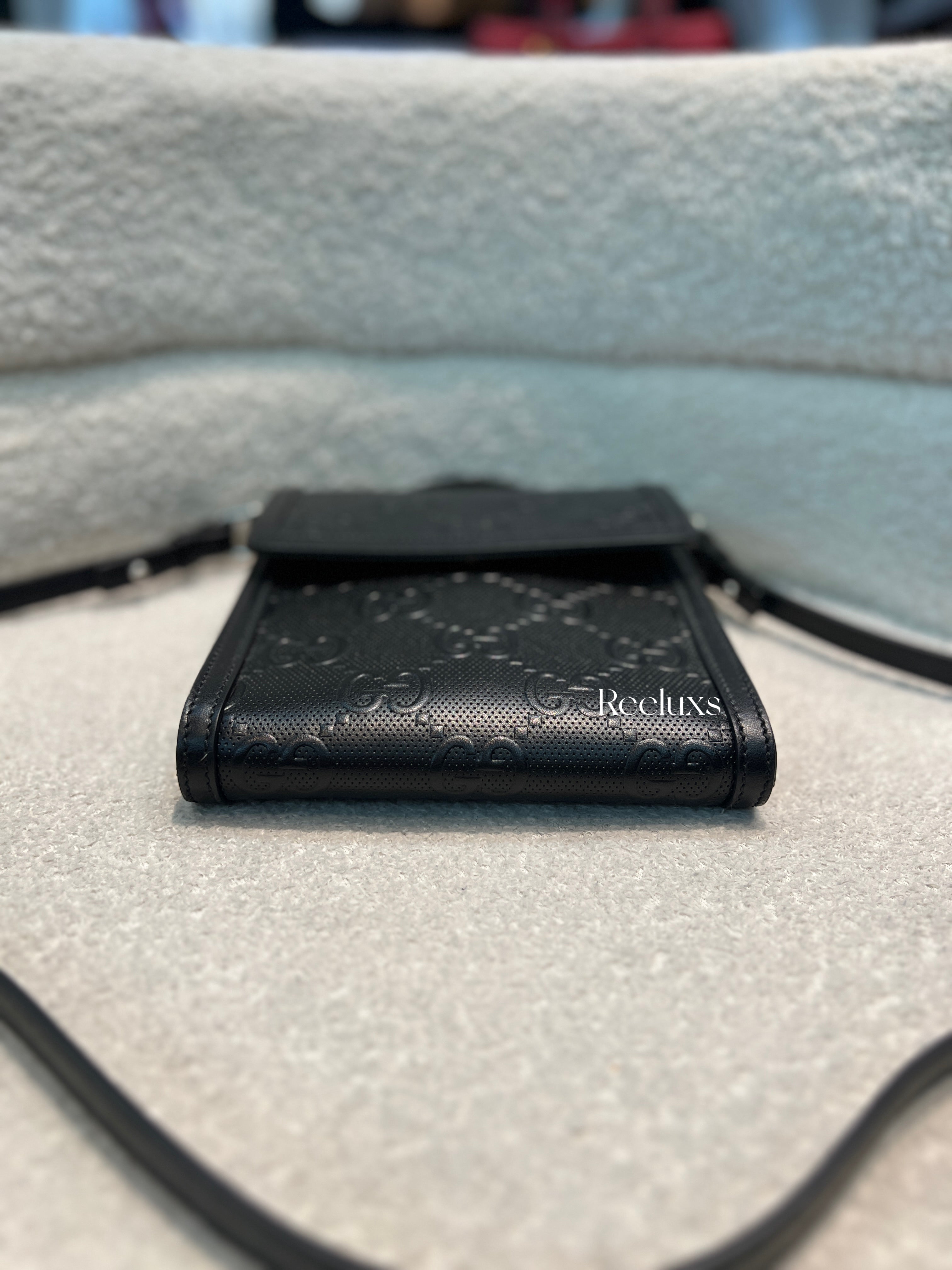 GUCCI GG Embossed Messenger Bag