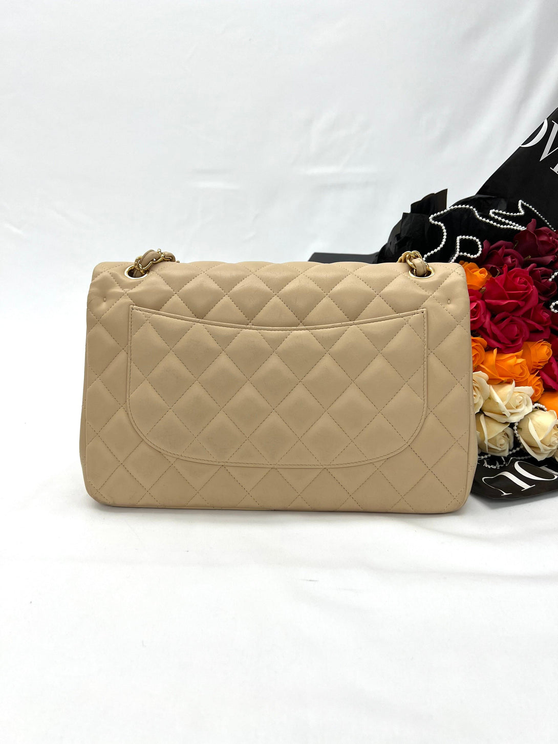 CHANEL Beige Lambskin Jumbo Classic Flap - Reeluxs 