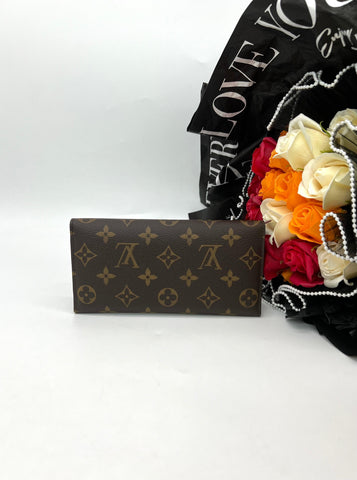 LOUIS VUITTON
Monogram Josephine Wallet - Reeluxs 