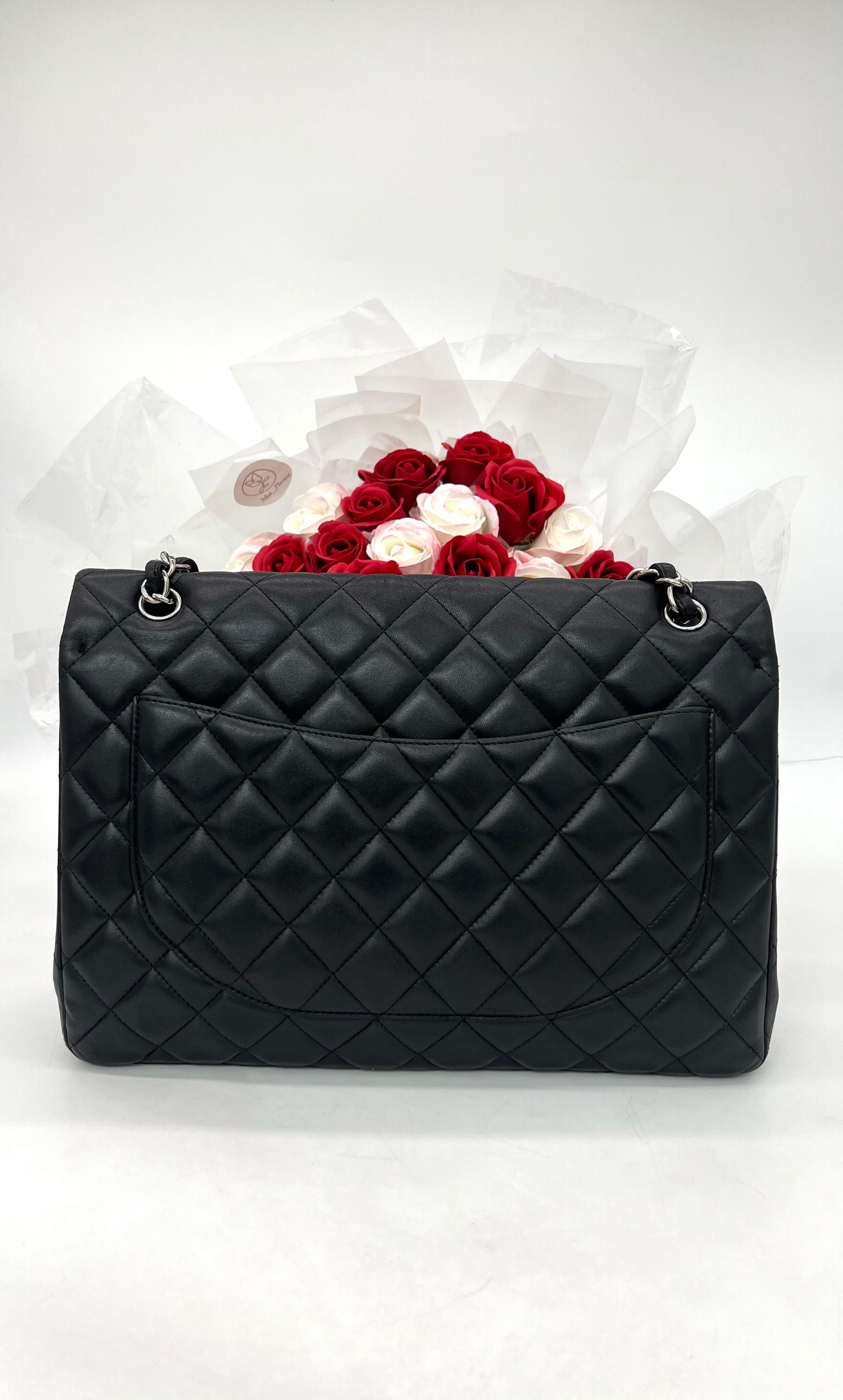 CHANEL Black Quilted Lambskin Maxi Classic Double Flap Silver Chain - Reeluxs 