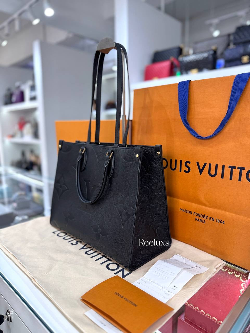 LOUIS VUITTON OnTheGo MM Black Monogram Empreinte Leather