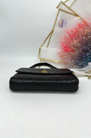 CHANEL Black Quilted Lambskin Vintage Classic Top Handle Clutch - Reeluxs 