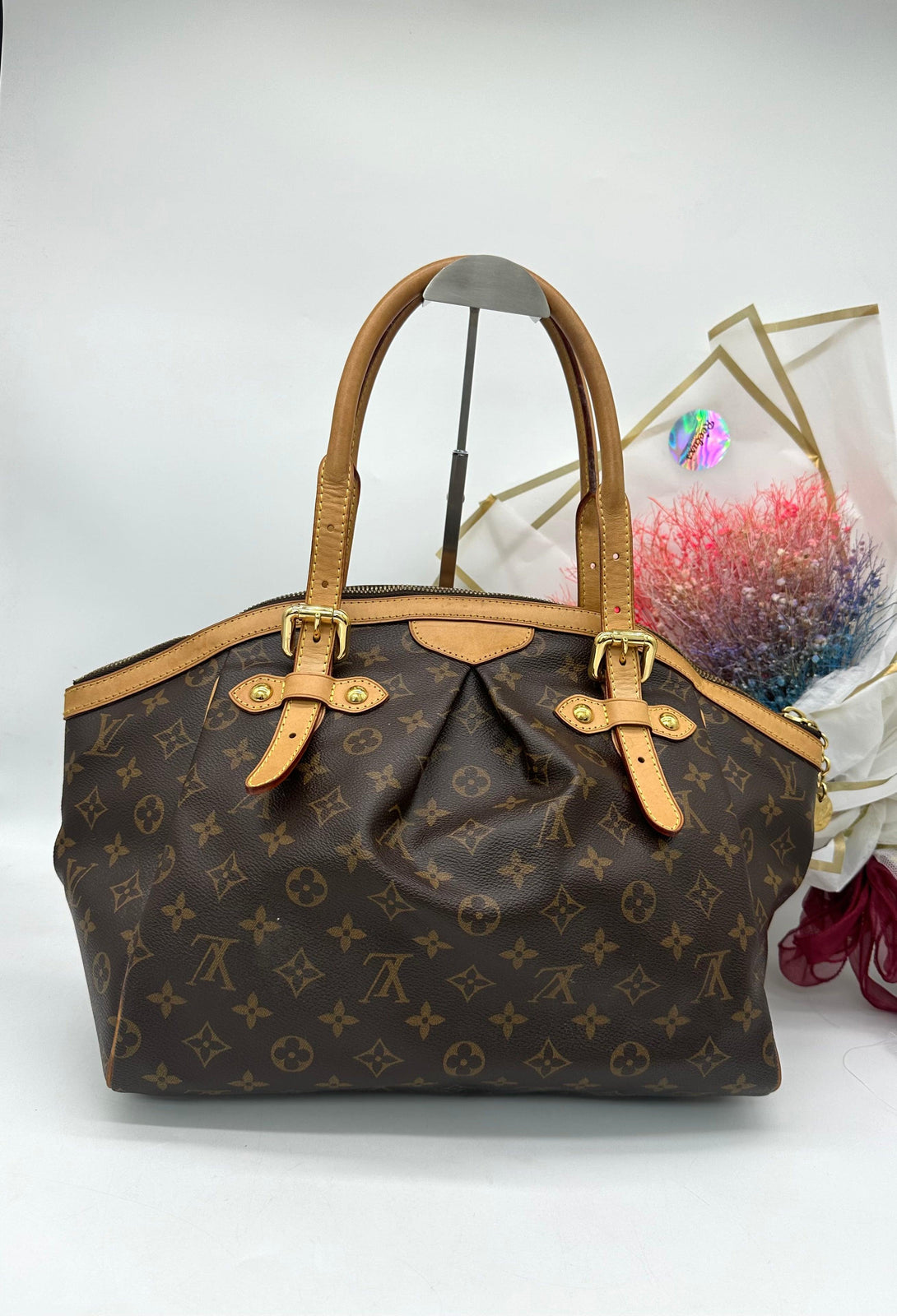 LOUIS VUITTON 
Monogram Tivoli GM Brown - Reeluxs 