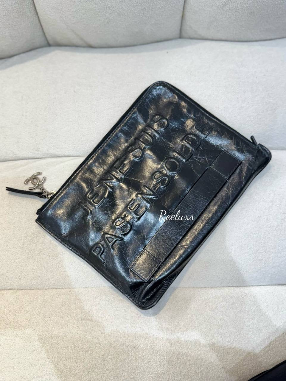 CHANEL Je Ne Suis En Solde Black Distressed Calfskin Pouch Clutch Bag