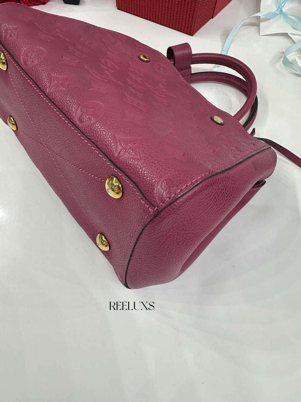 Louis Vuitton LV  Montaigne Bag crafted Monogram Empreinte leather