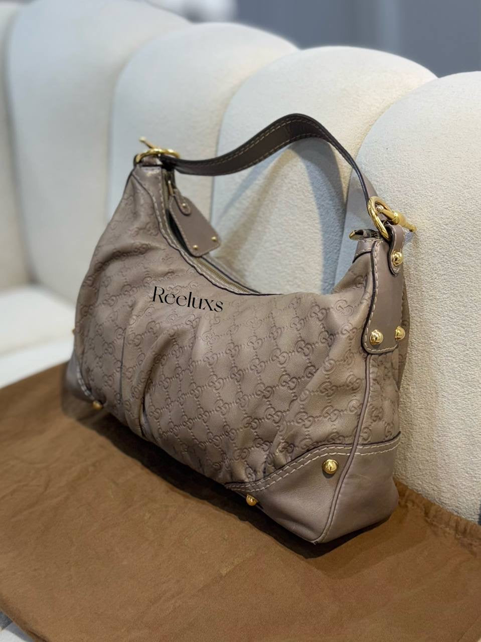 GUCCI Guccissima Leather Jockey Hobo Bag