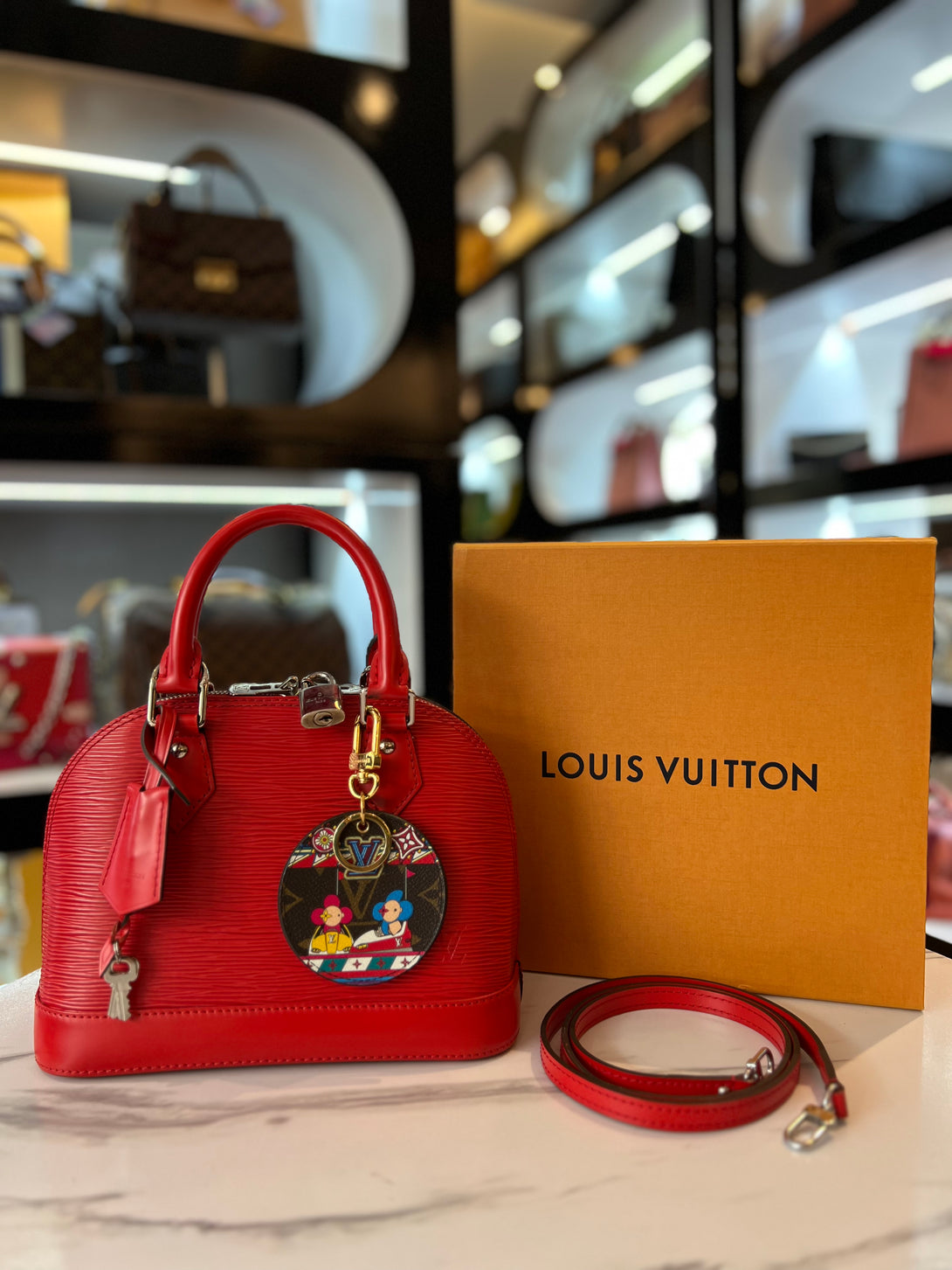 LOUIS VUITTON Epi Alma PM Rouge Red For Women Sling Bag - Reeluxs 